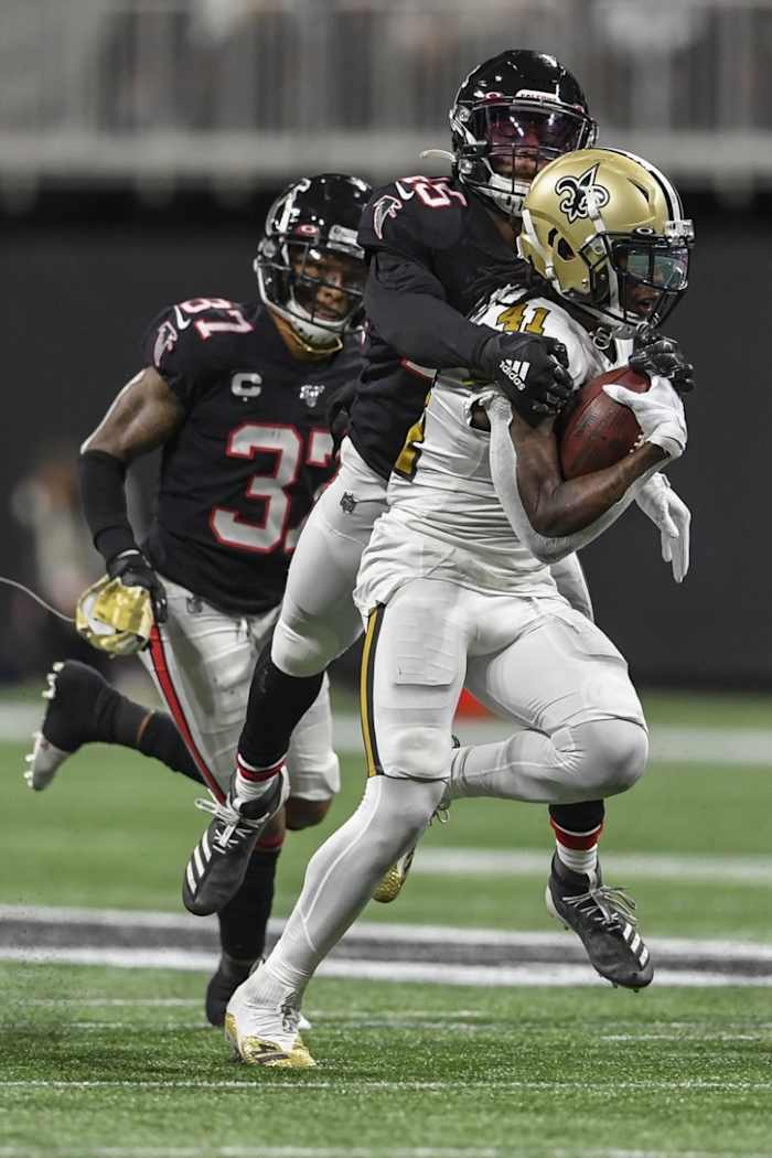 Saints running back Alvin Kamara (41) is tackled from behind by Atlanta Falcons linebacker Deion Jones (45). Mandatory Credit: Dale Zanine-USA TODAY